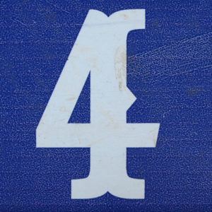 white number 4 on blue background.